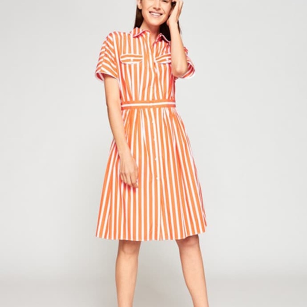 Orange stripped dress with open back.